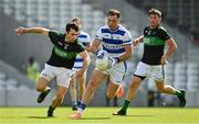 29 August 2021; Ronald Whelton of Castlehaven in action against Stephen Cronin of Nemo Rangers  during the 2020 Cork County Senior Club Football Championship Final match between between Castlehaven and Nemo Rangers at Páirc Ui Chaoimh in Cork. Photo by Brendan Moran/Sportsfile