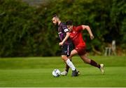 29 August 2021; Paul Fox of Wexford in action against Sean Rodgers of Killester Donnycarney during the extra.ie FAI Cup Second Round match between Killester Donnycarney and Wexford at Hadden Park in Killester, Dublin. Photo by Eóin Noonan/Sportsfile