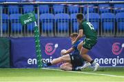 29 August 2021; Ronan Foxe of Leinster scores his side's fourth try despite the tackle of Adam O'Carroll of Connacht during the IRFU U18 Men’s Interprovincial Championship Round 2 match between Leinster and Connacht at Energia Park in Dublin. Photo by Harry Murphy/Sportsfile