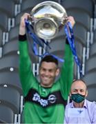 29 August 2021; An Taoiseach Micheál Martin TD watches his son, Nemo Rangers captain Micheal Aodh Martin lift the cup, after the 2020 Cork County Senior Club Football Championship Final match between between Castlehaven and Nemo Rangers at Páirc Ui Chaoimh in Cork. Photo by Brendan Moran/Sportsfile