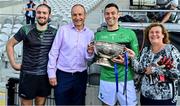 29 August 2021; Nemo Rangers captain Micheal Aodh Martin, third from left, and brother Cillian, and their parents Mary Martin and An Taoiseach Micheál Martin TD, celebrate with the cup after the 2020 Cork County Senior Club Football Championship Final match between between Castlehaven and Nemo Rangers at Páirc Ui Chaoimh in Cork. Photo by Brendan Moran/Sportsfile