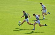 29 August 2021; Ronan Dalton of Nemo Rangers races clear of Jamie Walsh and Rory Maguire of Castlehaven during the 2020 Cork County Senior Club Football Championship Final match between between Castlehaven and Nemo Rangers at Páirc Ui Chaoimh in Cork. Photo by Brendan Moran/Sportsfile