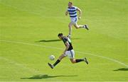 29 August 2021; Luke Connolly of Nemo Rangers on the way to scoring his second and his side's third goal, despite the best efforts of Damien Cahalane of Castlehaven, during the 2020 Cork County Senior Club Football Championship Final match between between Castlehaven and Nemo Rangers at Páirc Ui Chaoimh in Cork. Photo by Brendan Moran/Sportsfile