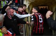29 August 2021; Rob Cornwall of Bohemians celebrates with supporters following the extra.ie FAI Cup second round match between Bohemians and Shamrock Rovers at Dalymount Park in Dublin. Photo by Stephen McCarthy/Sportsfile