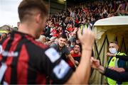 29 August 2021; Bohemians supporters celebrate with Rory Feely following the extra.ie FAI Cup second round match between Bohemians and Shamrock Rovers at Dalymount Park in Dublin. Photo by Stephen McCarthy/Sportsfile