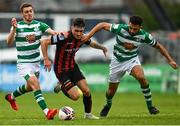 29 August 2021; Dawson Devoy of Bohemians in action against Dylan Watts, left, and Roberto Lopes of Shamrock Rovers during the extra.ie FAI Cup second round match between Bohemians and Shamrock Rovers at Dalymount Park in Dublin. Photo by Eóin Noonan/Sportsfile