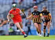 29 August 2021; Hannah Looney of Cork gets away from Katie Nolan and Katie Power, right, of Kilkenny during the All-Ireland Senior Camogie Championship Semi-Final match between Cork and Kilkenny at Croke Park in Dublin. Photo by Piaras Ó Mídheach/Sportsfile