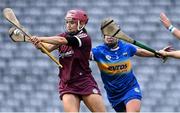 29 August 2021; Mary Ryan of Tipperary, centre, knocks the ball away from Orlaith McGrath of Galway as she prepares to take a shot on goal during the All-Ireland Senior Camogie Championship Semi-Final match between Tipperary and Galway at Croke Park in Dublin. Photo by Piaras Ó Mídheach/Sportsfile