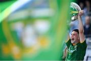 28 August 2021; Meath captain Liam Kelly lifts the Tom Markham Cup following the Electric Ireland GAA Football All-Ireland Minor Championship Final match between Meath and Tyrone at Croke Park in Dublin. Photo by Stephen McCarthy/Sportsfile