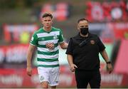 29 August 2021; Ronan Finn of Shamrock Rovers leaves the pitch after being sent off, accompanied by Derek Monaghan of Bohemians, during the extra.ie FAI Cup second round match between Bohemians and Shamrock Rovers at Dalymount Park in Dublin. Photo by Stephen McCarthy/Sportsfile