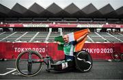 31 August 2021; Gary O'Reilly of Ireland celebrates with the Irish tri-colour after finishing 3rd place in the Men's H5 Time Trial at the Fuji International Speedway on day seven during the Tokyo 2020 Paralympic Games in Shizuoka, Japan. Photo by David Fitzgerald/Sportsfile