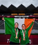31 August 2021; Eve McCrystal, left, and Katie George Dunlevy of Ireland, celebrate with the Irish tri-colour and their gold medals during the medal ceremony after the Women's B Time Trial at the Fuji International Speedway on day seven during the Tokyo 2020 Paralympic Games in Shizuoka, Japan. Photo by David Fitzgerald/Sportsfile