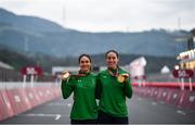 31 August 2021; Katie-George Dunlevy, left, and Eve McCrystal of Ireland celebrate with their gold medals following the Women's B Time Trial at the Fuji International Speedway on day seven during the Tokyo 2020 Paralympic Games in Shizuoka, Japan. Photo by David Fitzgerald/Sportsfile