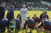 7 March 2004; Westmeath manager Paidi O Se speaks to his players before the start of the game. Allianz Football League 2004, Division 1A, Round 4, Westmeath v Dublin, Cusack Park, Mullingar, Co. Westmeath. Picture credit; Ray McManus / SPORTSFILE *EDI*