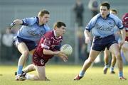 7 March 2004; Aidan Canning, Westmeath, in action against Conal Keaney, left, and Declan Lally, Dublin. Allianz Football League 2004, Division 1A, Round 4, Westmeath v Dublin, Cusack Park, Mullingar, Co. Westmeath. Picture credit; Ray McManus / SPORTSFILE *EDI*