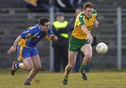 7 March 2004; John Haran, Donegal, in action against John Hanley, Roscommon. Allianz Football League 2004, Division 2A, Round 4, Roscommon v Donegal, Dr. Hyde Park, Co. Roscommon. Picture credit; Damien Eagers / SPORTSFILE *EDI*