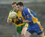 7 March 2004; John Rogers, Roscommon, in action against Raymond Sweeney, Donegal. Allianz Football League 2004, Division 2A, Round 4, Roscommon v Donegal, Dr. Hyde Park, Co. Roscommon. Picture credit; Damien Eagers / SPORTSFILE *EDI*