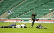 5 March 2004; Ireland out half Ronan O'Gara is photographed by photographers during kicking practice at Twickenham Stadium, London, England. Picture credit; Brendan Moran / SPORTSFILE *EDI*