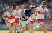 20 July 2013; Tomas Corr, Cavan, in action against Enda Lynn and Mark Lynch, Derry. GAA Football All-Ireland Senior Championship, Round 3, Derry v Cavan, Celtic Park, Derry. Picture credit: Oliver McVeigh / SPORTSFILE