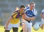 20 July 2013; Ciaran Lyng, Wexford, in action against Peter O'Leary, Laois. GAA Football All-Ireland Senior Championship Round 3, Wexford v Laois, Wexford Park, Wexford Picture credit: David Maher / SPORTSFILE