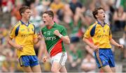 21 July 2013; Liam Irwin, Mayo, celebrates after scoring his side's second goal as Roscommon's Ronan Daly, left, and Martin Flannery watch on. Electric Ireland Connacht GAA Football Minor Championship Final, Roscommon v Mayo, Elverys MacHale Park, Castlebar, Co. Mayo. Picture credit: Stephen McCarthy / SPORTSFILE