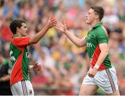 21 July 2013; Liam Irwin, Mayo, celebrates after scoring his side's second goal with team-mate Tommy Conroy, left. Electric Ireland Connacht GAA Football Minor Championship Final, Roscommon v Mayo, Elverys MacHale Park, Castlebar, Co. Mayo. Picture credit: Stephen McCarthy / SPORTSFILE