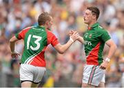 21 July 2013; Liam Irwin, Mayo, celebrates after scoring his side's second goal with team-mate Darragh Doherty, left. Electric Ireland Connacht GAA Football Minor Championship Final, Roscommon v Mayo, Elverys MacHale Park, Castlebar, Co. Mayo. Picture credit: Stephen McCarthy / SPORTSFILE