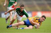 21 July 2013; Evan McGrath, Roscommon, in action against Cian Hanely, Mayo. Electric Ireland Connacht GAA Football Minor Championship Final, Roscommon v Mayo, Elverys MacHale Park, Castlebar, Co. Mayo. Picture credit: Stephen McCarthy / SPORTSFILE