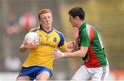 21 July 2013; Shane Pettit, Roscommon, in action against Conor Loftus, Mayo. Electric Ireland Connacht GAA Football Minor Championship Final, Roscommon v Mayo, Elverys MacHale Park, Castlebar, Co. Mayo. Picture credit: Stephen McCarthy / SPORTSFILE
