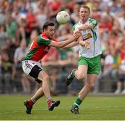21 July 2013; Cathal Magee, London, in action against Kevin McLoughlin, Mayo. Connacht GAA Football Senior Championship Final, Mayo v London, Elverys MacHale Park, Castlebar, Co. Mayo. Picture credit: Stephen McCarthy / SPORTSFILE