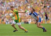 21 July 2013; Anthony Thompson, Donegal, in action against Padraig Donaghy, Monaghan. Ulster GAA Football Senior Championship Final, Donegal v Monaghan, St Tiernach's Park, Clones, Co. Monaghan. Picture credit: Oliver McVeigh / SPORTSFILE