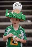 21 July 2013; London supporter Shane Lynnott, seven years, from Middlesex, West London, enjoys an ice cream at half time. Connacht GAA Football Senior Championship Final, Mayo v London, Elverys MacHale Park, Castlebar, Co. Mayo. Picture credit: Ray McManus / SPORTSFILE