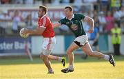 20 July 2013; Mark Donnelly, Tyrone, in action against Pádraig O'Neill, Kildare. GAA Football All-Ireland Senior Championship, Round 3, Kildare v Tyrone, St Conleth's Park, Newbridge, Co. Kildare. Picture credit: Stephen McCarthy / SPORTSFILE