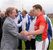 21 July 2013; An Taoiseach Enda Kenny, T.D., shakes hands with Mayo captain Andy Moran before the game. Connacht GAA Football Senior Championship Final, Mayo v London, Elverys MacHale Park, Castlebar, Co. Mayo. Picture credit: Ray McManus / SPORTSFILE