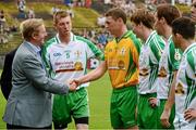 21 July 2013; An Taoiseach Enda Kenny, T.D., is introduced to the London goalkeeper Declan Traynor by captain Seamus Hannon. Connacht GAA Football Senior Championship Final, Mayo v London, Elverys MacHale Park, Castlebar, Co. Mayo. Picture credit: Ray McManus / SPORTSFILE