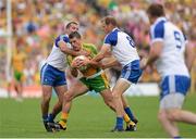 21 July 2013; Paddy McGrath, Donegal, in action against Padraig Donaghy and Owen Lennon, Monaghan. Ulster GAA Football Senior Championship Final, Donegal v Monaghan, St Tiernach's Park, Clones, Co. Monaghan. Picture credit: Oliver McVeigh / SPORTSFILE