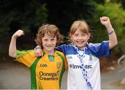 21 July 2013; Monaghan supporter Aoibhinn McMahon, aged 9, from Threemilehouse, Co. Monaghan, and her cousin Daith’ McMahon, aged 7, from Ballybofey, Co. Donegal, before the game. Ulster GAA Football Senior Championship Final, Donegal v Monaghan, St Tiernach's Park, Clones, Co. Monaghan. Picture credit: Daire Brennan / SPORTSFILE
