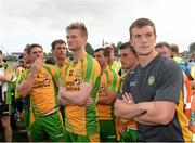 21 July 2013; A dejected Ryan Bradley, Ross Wherity and Leo McLoone, Donegal, at the end of the game. Ulster GAA Football Senior Championship Final, Donegal v Monaghan, St Tiernach's Park, Clones, Co. Monaghan. Picture credit: Oliver McVeigh / SPORTSFILE