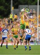21 July 2013; Rory Kavanagh, left, and Ross Wherity, Donegal, attempt to field a high ball. Ulster GAA Football Senior Championship Final, Donegal v Monaghan, St Tiernach's Park, Clones, Co. Monaghan. Picture credit: Daire Brennan / SPORTSFILE