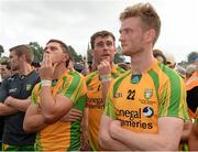 21 July 2013; A dejected Ryan Bradley, Eamonn McGee and Ross Wherity, Donegal, at the end of the game. Ulster GAA Football Senior Championship Final, Donegal v Monaghan, St Tiernach's Park, Clones, Co. Monaghan. Picture credit: Oliver McVeigh / SPORTSFILE