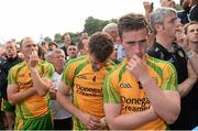 21 July 2013; A dejected Colm McFadden, Eamonn McGee and Patrick McBrearty, Donegal, at the end of the game. Ulster GAA Football Senior Championship Final, Donegal v Monaghan, St Tiernach's Park, Clones, Co. Monaghan. Picture credit: Oliver McVeigh / SPORTSFILE