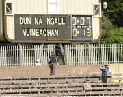 21 July 2013; A young Monaghan supporter takes a photograph of the scoreboard after the game. Ulster GAA Football Senior Championship Final, Donegal v Monaghan, St Tiernach's Park, Clones, Co. Monaghan. Picture credit: Daire Brennan / SPORTSFILE