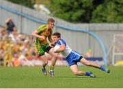 21 July 2013; Dessie Mone, Monaghan, in action against Ross Wherity, Donegal. Ulster GAA Football Senior Championship Final, Donegal v Monaghan, St Tiernach's Park, Clones, Co. Monaghan. Picture credit: Daire Brennan / SPORTSFILE
