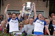 21 July 2013; Darren Hughes and Kieran Hughes, Monaghan, hold aloft the Anglo Celt cup after the game. Ulster GAA Football Senior Championship Final, Donegal v Monaghan, St Tiernach's Park, Clones, Co. Monaghan. Picture credit: Oliver McVeigh / SPORTSFILE