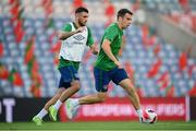 31 August 2021; Seamus Coleman and Troy Parrott, left, during a Republic of Ireland training session at Estádio Algarve in Faro, Portugal. Photo by Stephen McCarthy/Sportsfile