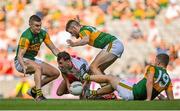 28 August 2021; Darragh Canavan of Tyrone in action against Kerry players, from left, Seán O'Shea, Graham O'Sullivan and Gavin Crowley during the GAA Football All-Ireland Senior Championship semi-final match between Kerry and Tyrone at Croke Park in Dublin. Photo by Piaras Ó Mídheach/Sportsfile