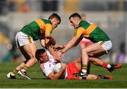 28 August 2021; Darren McCurry of Tyrone in action against Gavin White of Kerry, left, and Tom O'Sullivan of Kerry during the GAA Football All-Ireland Senior Championship semi-final match between Kerry and Tyrone at Croke Park in Dublin. Photo by Piaras Ó Mídheach/Sportsfile