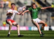 28 August 2021; Ronan Fox of Tyrone in action against Killian Smyth of Meath during the Electric Ireland GAA Football All-Ireland Minor Championship Final match between Meath and Tyrone at Croke Park in Dublin. Photo by Piaras Ó Mídheach/Sportsfile