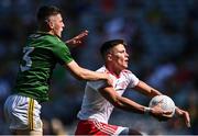 28 August 2021; Ruairí McHugh of Tyrone in action against Liam Kelly of Meath during the Electric Ireland GAA Football All-Ireland Minor Championship Final match between Meath and Tyrone at Croke Park in Dublin. Photo by Piaras Ó Mídheach/Sportsfile