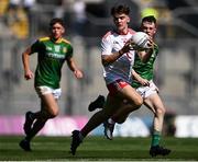 28 August 2021; Hugh Cunningham of Tyrone in action against Conor Ennis of Meath during the Electric Ireland GAA Football All-Ireland Minor Championship Final match between Meath and Tyrone at Croke Park in Dublin. Photo by Piaras Ó Mídheach/Sportsfile